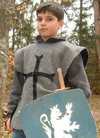 Knave’s shirt made from felt with a knight’s cross motive sewn on