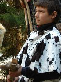 Fur cloak skin with hatchet.