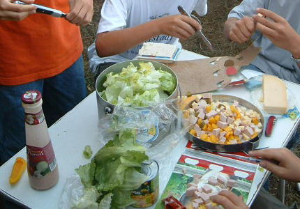 picture cooking for large groups - preparing dessert and salads