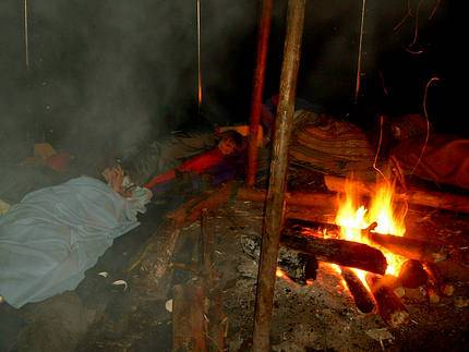 Camping in the Snow with a yurt; a fire inside the tent