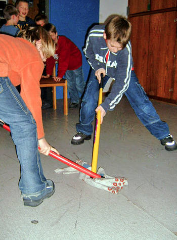 Broom hockey game
