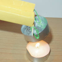 Tea light -water-see saw